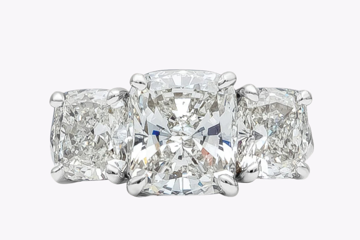 GIA Certified 5.02 Carats Cushion Cut Diamond Three-Stone Engagement Ring in Platinum