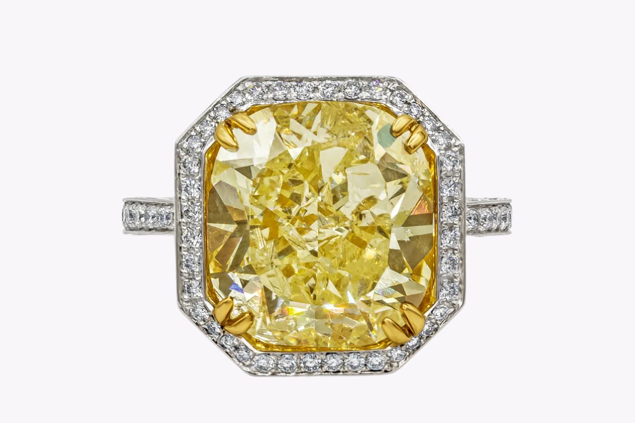 GIA Certified 7.64 Carats Cushion Cut Yellow Diamond Halo Engagement Ring in Yellow Gold & Platinum