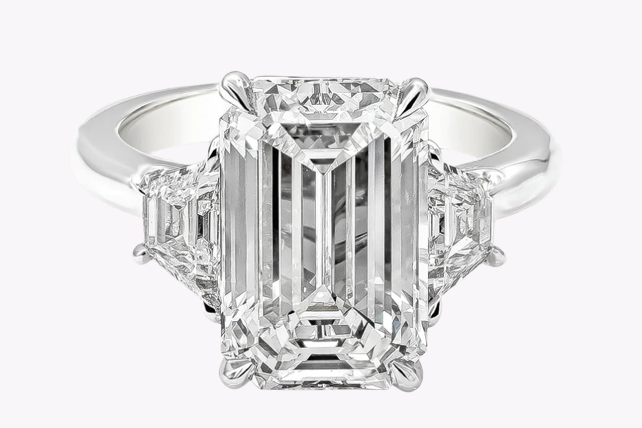 GIA Certified 5.80 Carats Elongated Emerald Cut Diamond Three-Stone Engagement Ring in Platinum