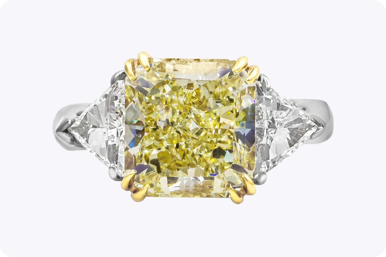 GIA Certified 4.50 Carats Radiant Cut Yellow Diamond Three-Stone Engagement Ring in Yellow Gold & Platinum