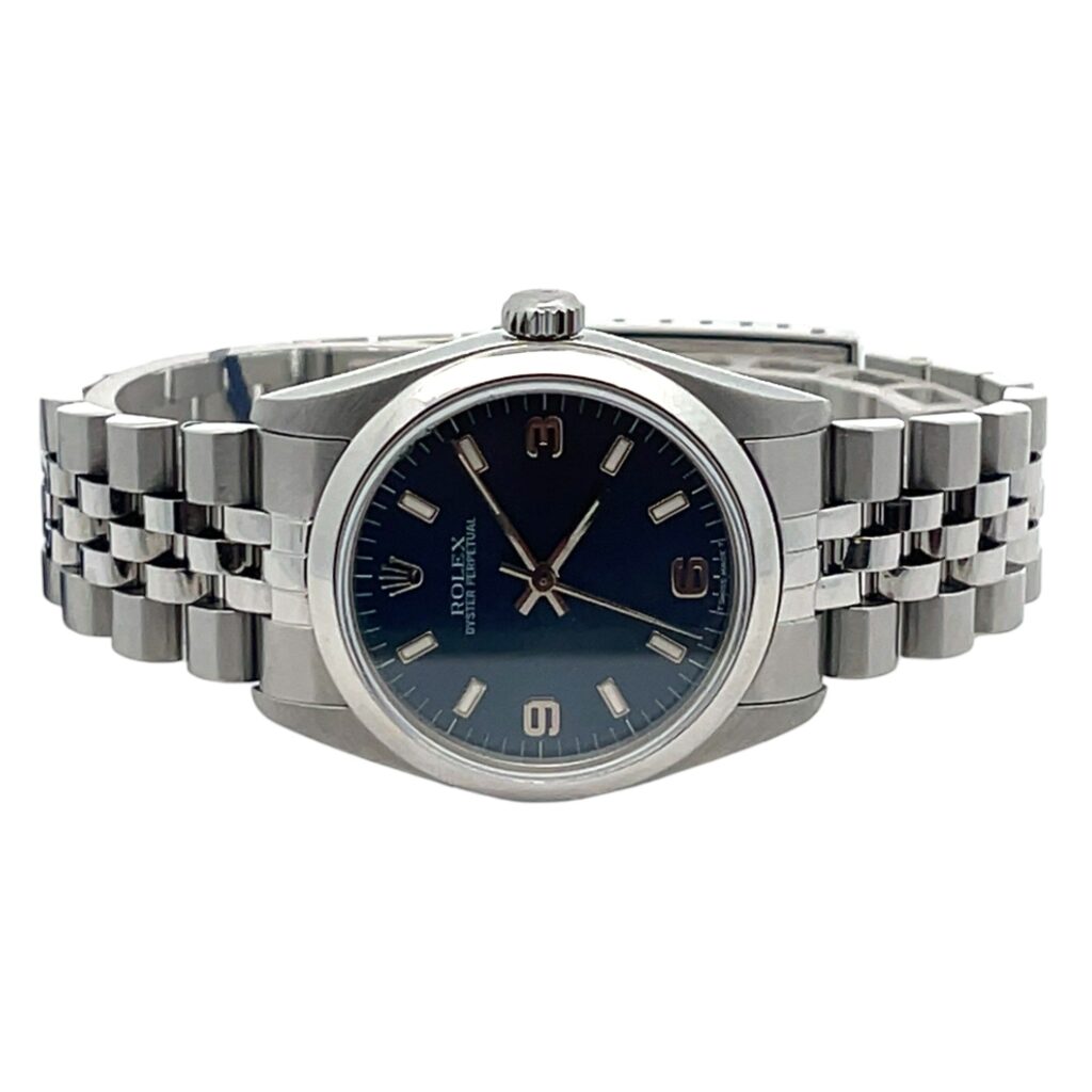 Rolex Oyster Perpetual 67480 Steel Blue Index Dial - Angle View by Rolex