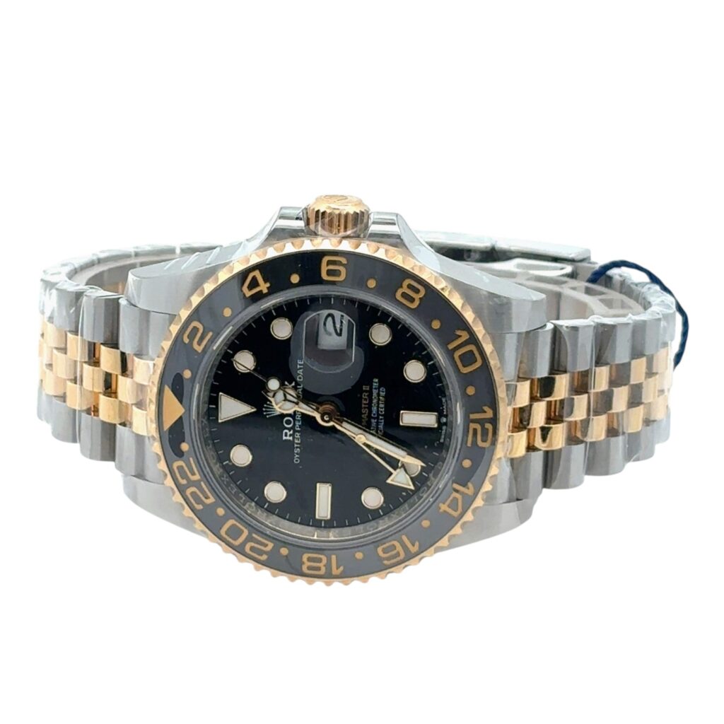Rolex GMT-Master II 126713GRNR Yellow Gold & Steel Black Dial - Angle View by Rolex