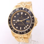 Rolex GMT-Master 16758 18k Yellow Gold Black Dial - Front View by Rolex