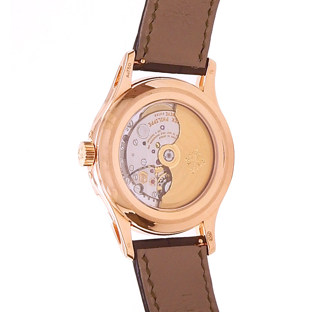 Patek Philippe Complications Annual Calendar 5205R-011 18k Rose Gold Green Dial 5 Patek Philippe Complications Annual Calendar 5205R-011 18k Rose Gold Green Dial - Wrist / Lifestyle View by Patek Philippe
